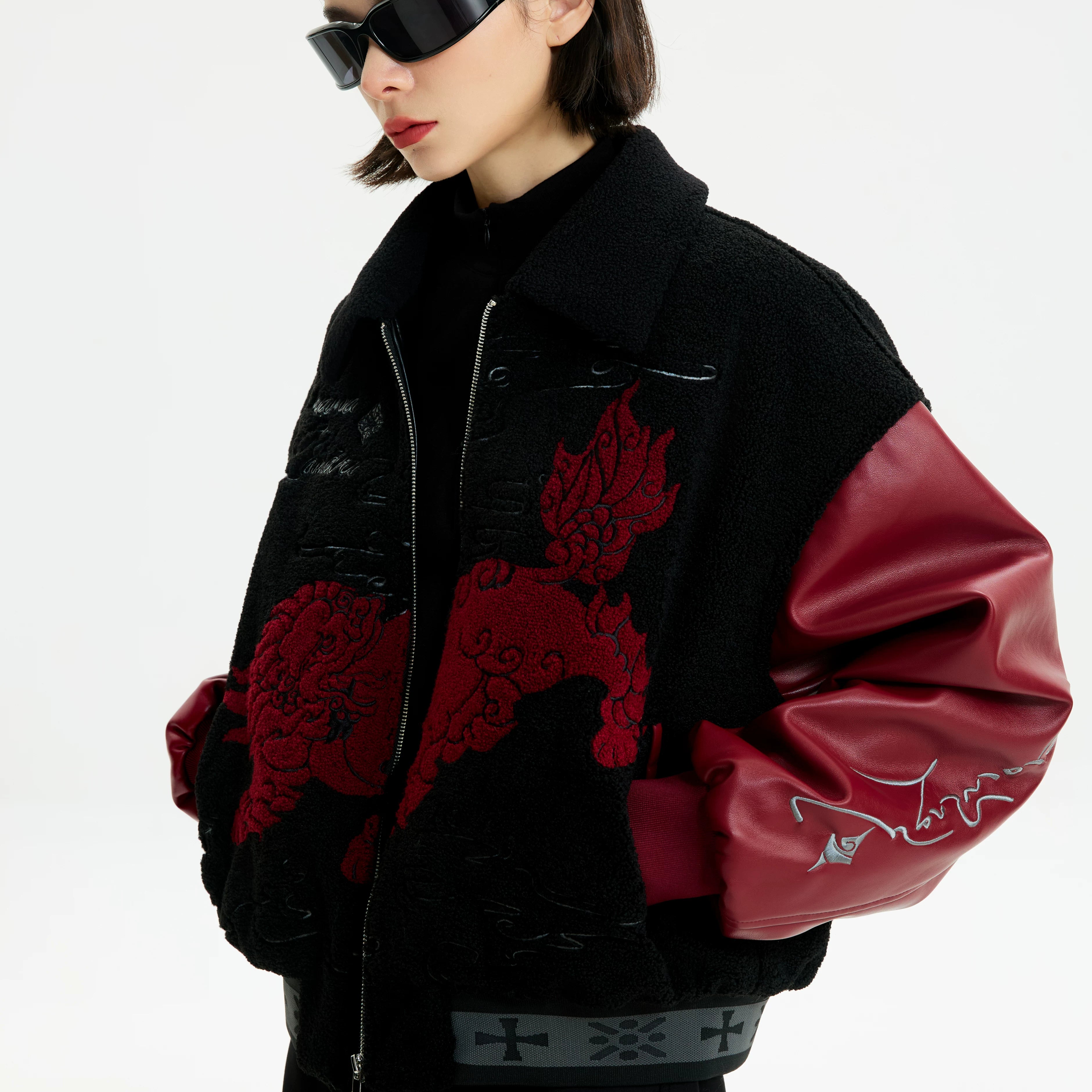 Sanhoostudio zip-up leather jacket with sherpa lining for warmth. Designed for unisex winter streetwear and comfort.