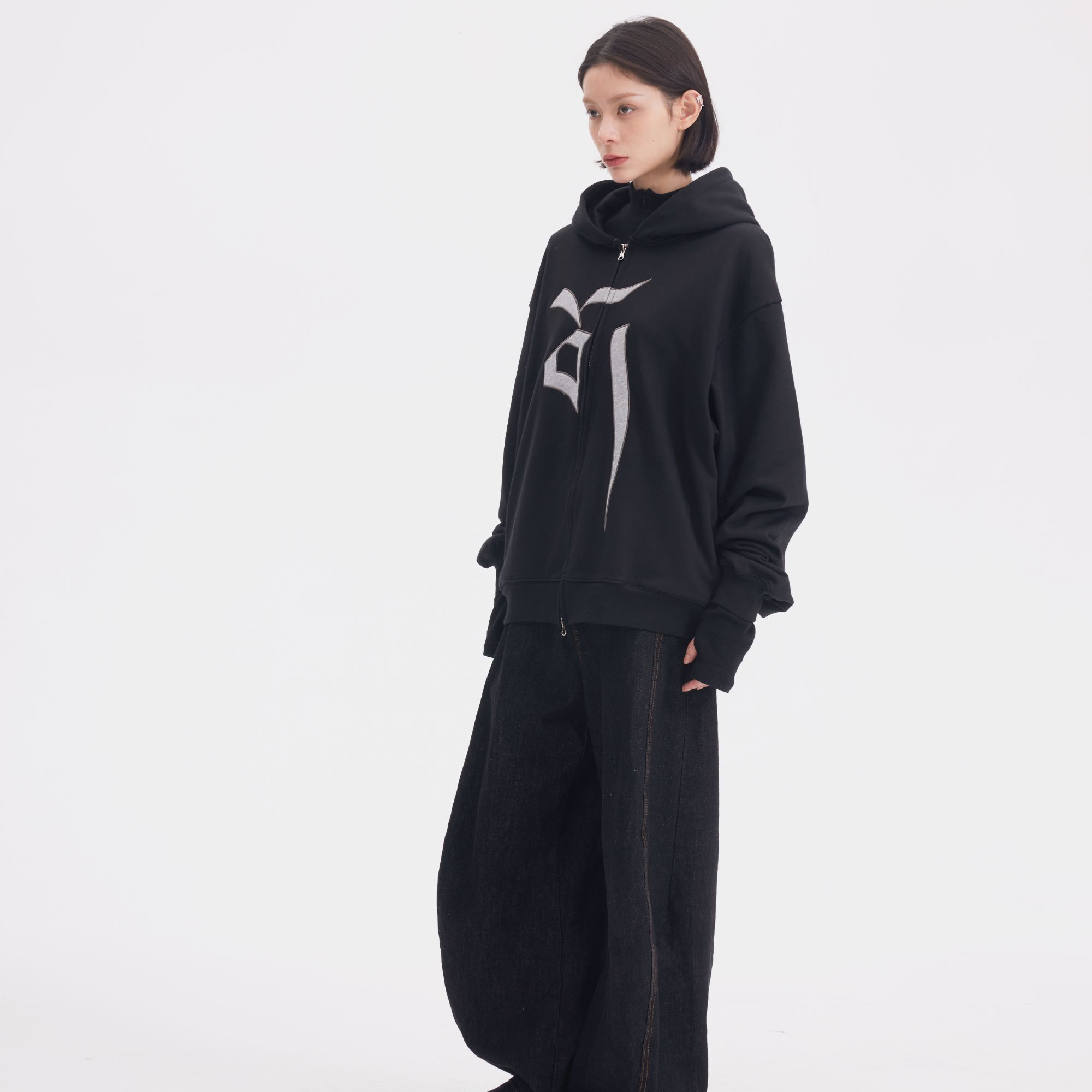 Sanhoostudio hooded sweatshirt featuring Vajra-inspired design and relaxed oversized fit for unisex streetwear.