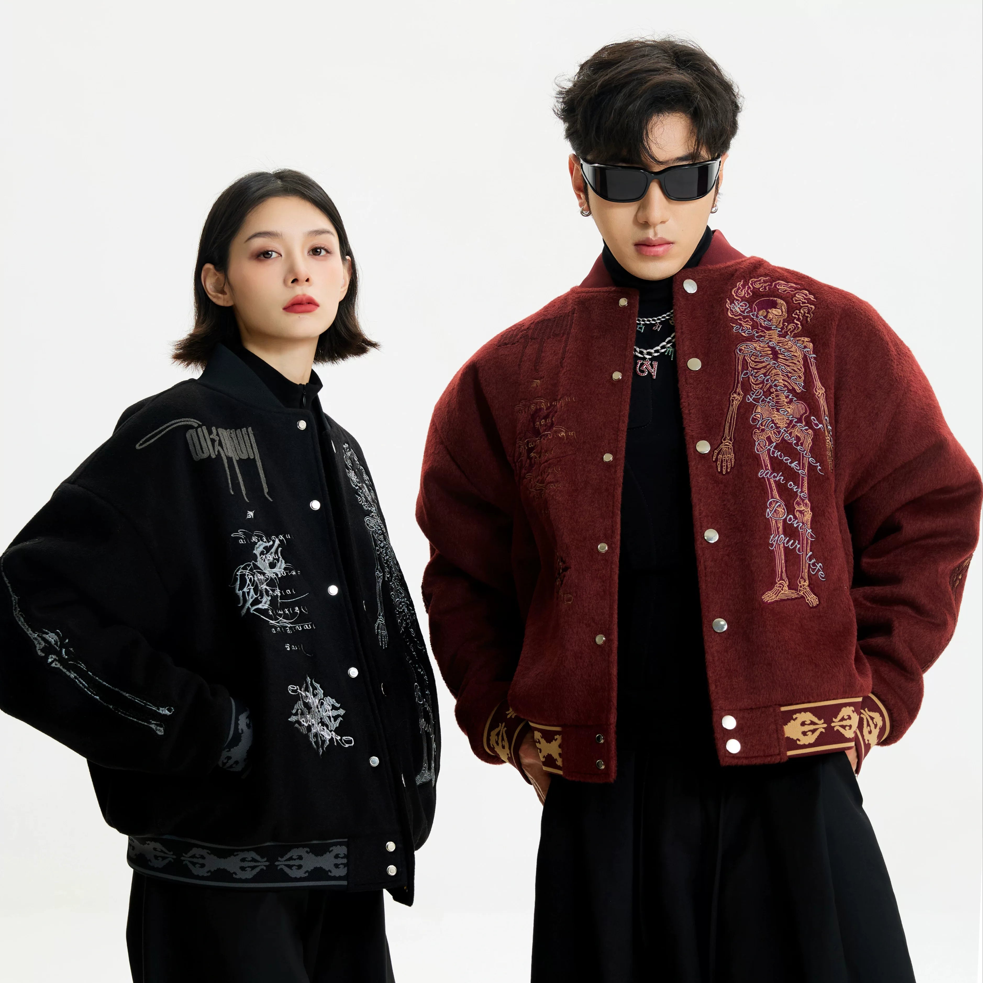 Sanhoostudio heavyweight varsity jacket with embroidery and warm construction. Designed for unisex winter streetwear.