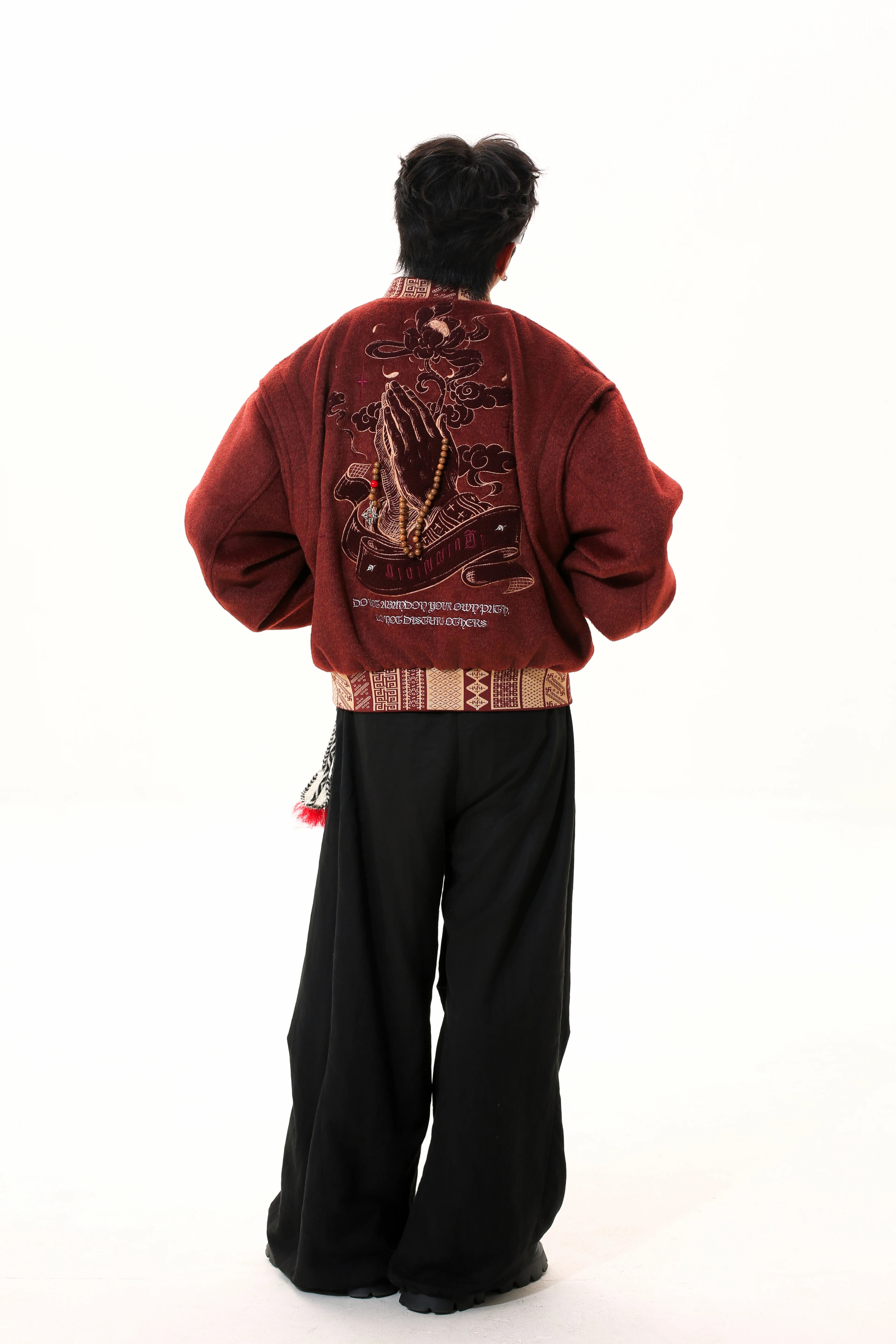 Sanhoostudio heavyweight varsity jacket with embroidered details. Designed for unisex fall streetwear and layering.