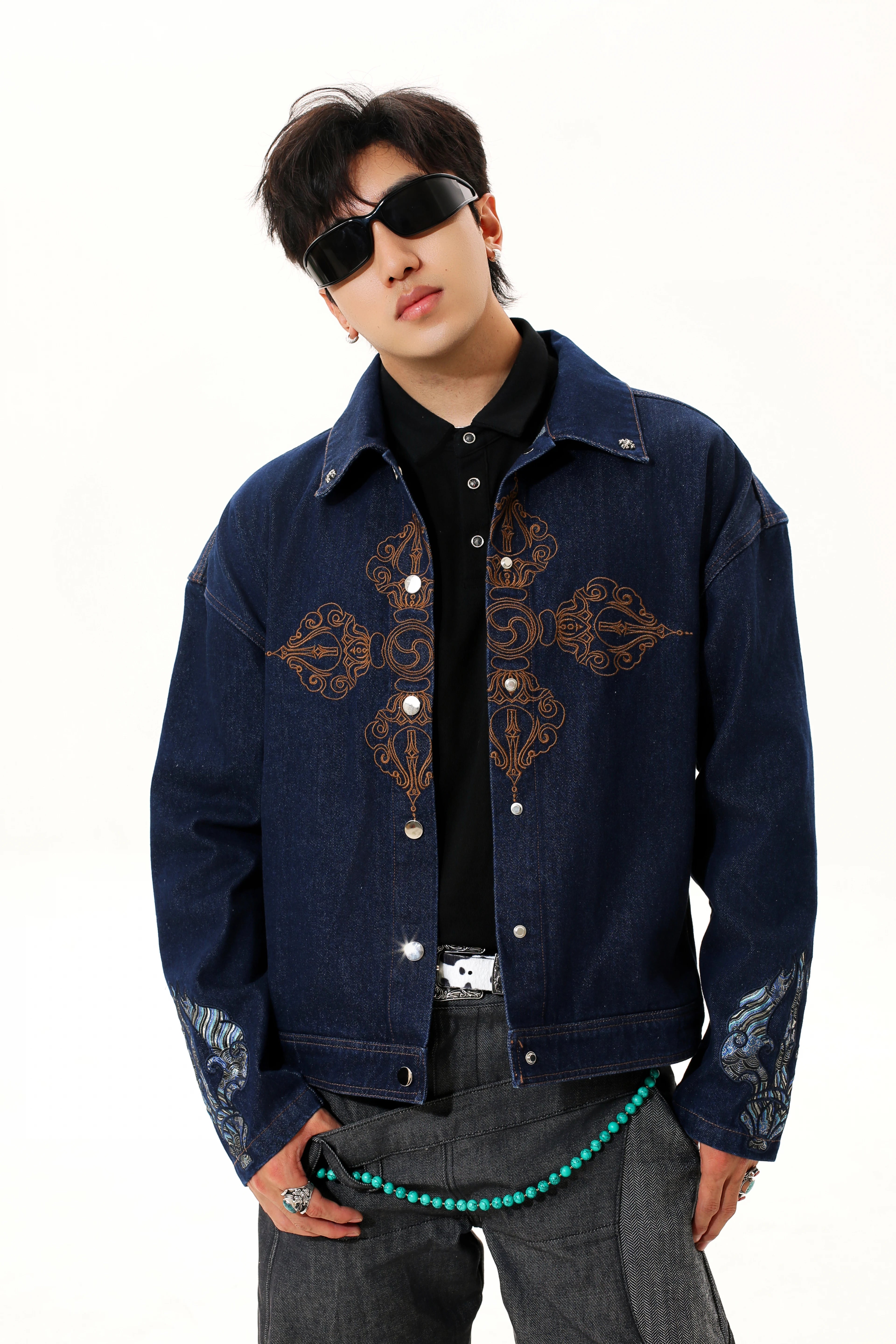 Sanhoostudio denim jacket featuring Vajra embroidery and a relaxed streetwear silhouette. Designed for unisex wear with durable denim fabric for fall styling.