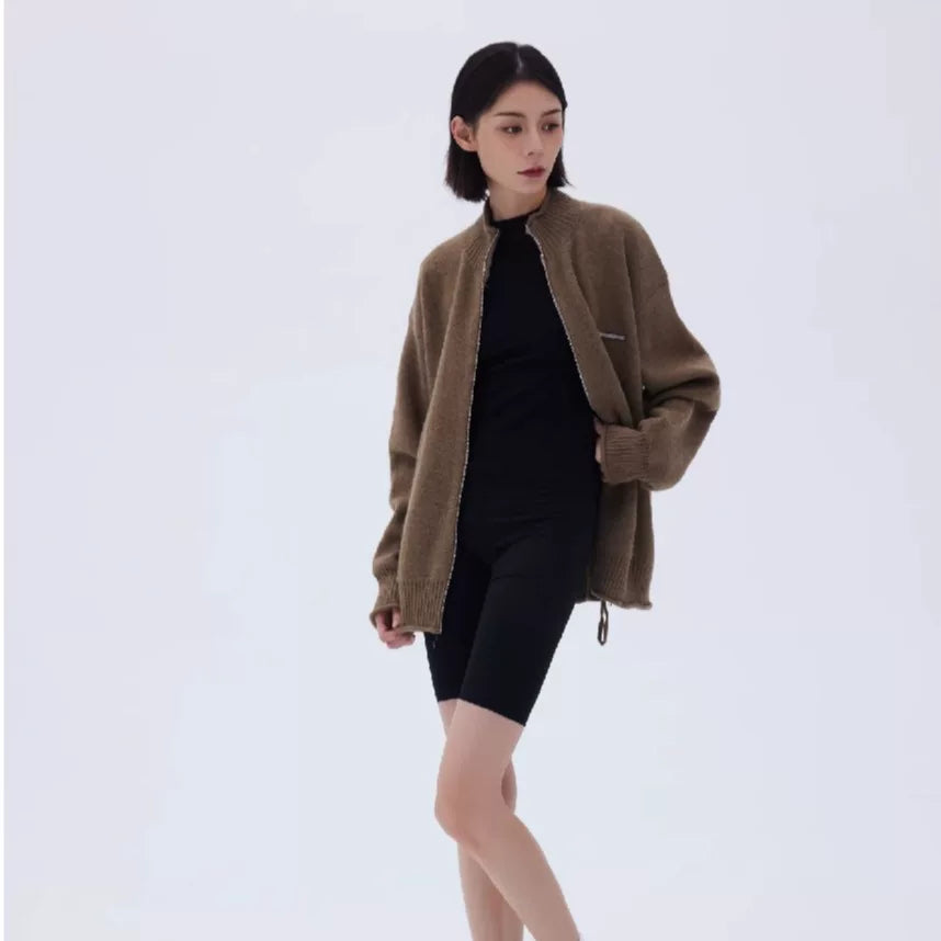 Sanhoostudio knit cardigan with rolled hem detail and relaxed fit. A unisex piece designed for daily wear and layering.