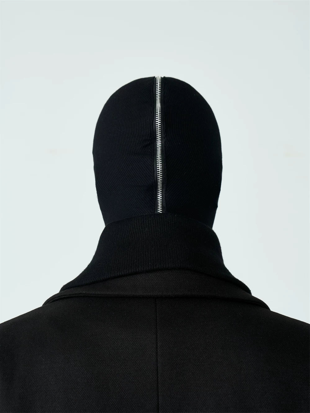 Sanhoostudio black and white zip-up hood mask designed for unisex streetwear styling. Featuring a full zip closure, foldable structure, and warm layered design for casual spring wear.