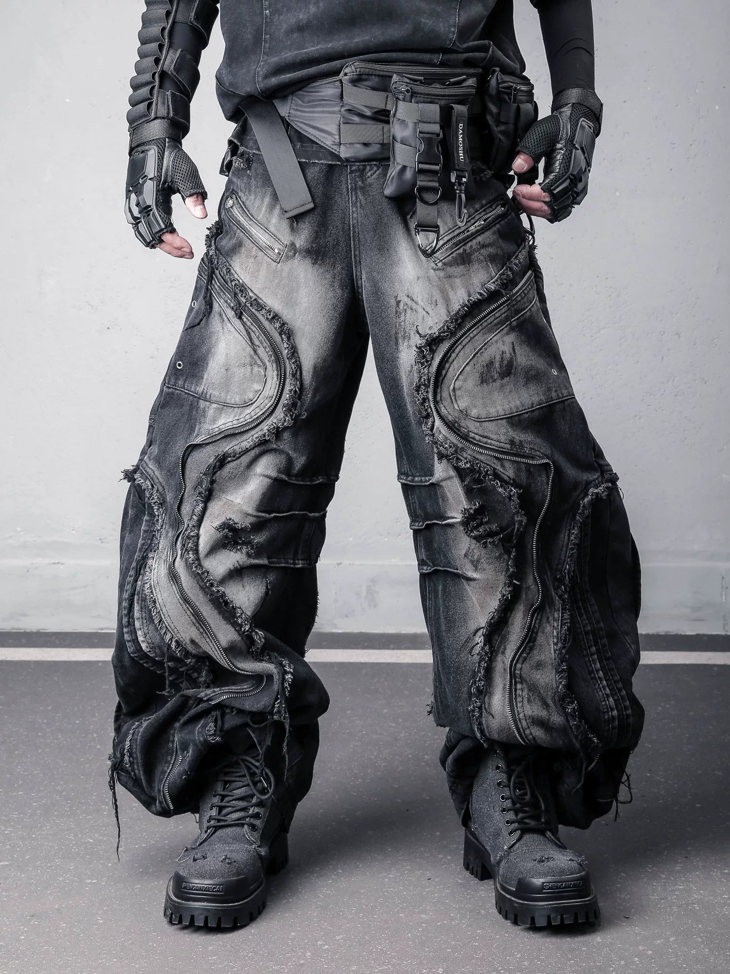 Sanhoostudio denim pants featuring fringe details, deconstructed design, and wide leg silhouette for standout streetwear outfits.