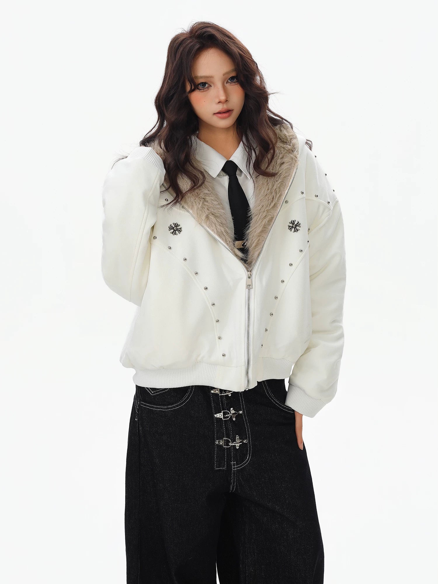 Sanhoostudio padded jacket with fur collar and hooded design, featuring mountain eagle detailing and stud accents. Built for warmth with a structured streetwear silhouette for winter styling.