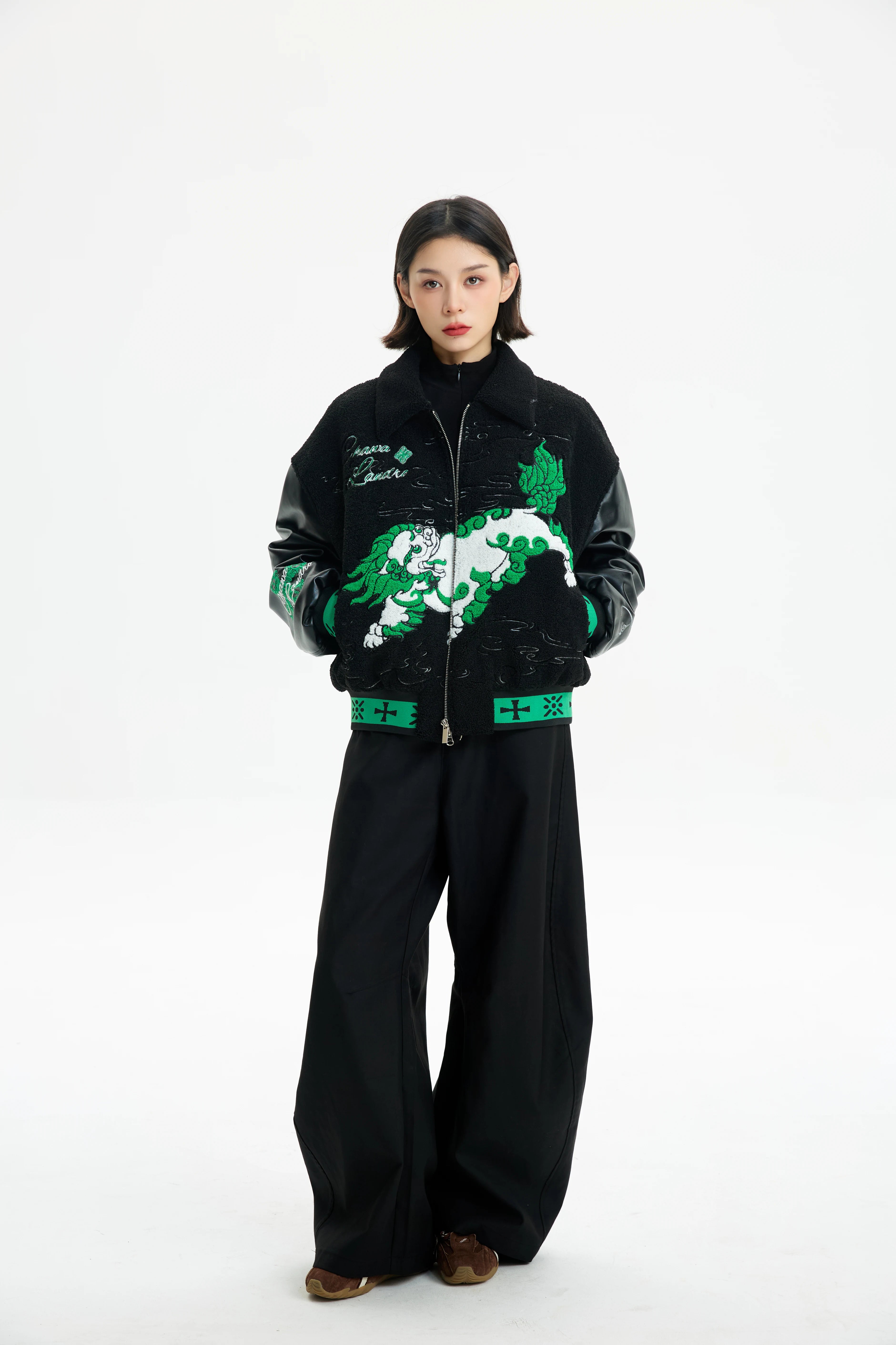 Sanhoostudio zip-up leather jacket with sherpa lining for warmth. Designed for unisex winter streetwear and comfort.