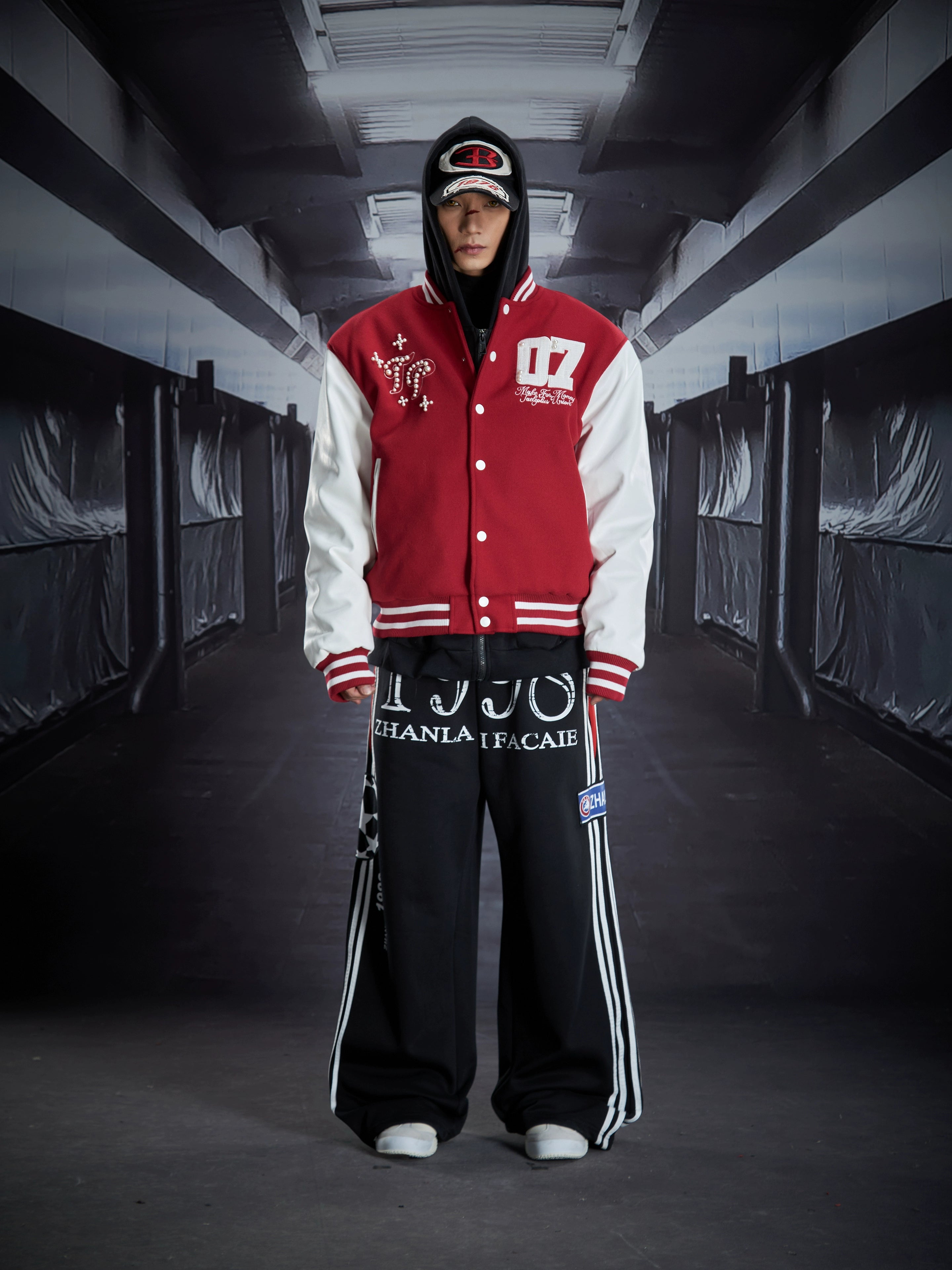 A jersey-inspired bomber jacket featuring pearl embellishments, embroidery detailing, and quilted padding for warmth. A stylish winter streetwear piece by Sanhoostudio.