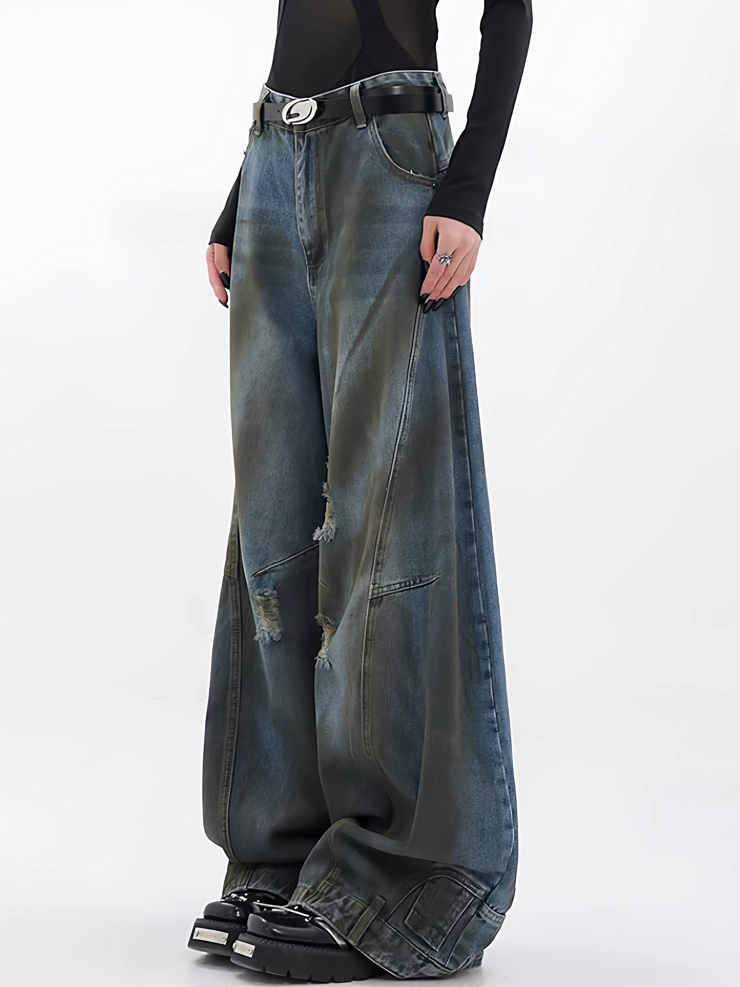 Sanhoostudio wide leg jeans featuring reverse panel construction and distressed details. A high street denim piece with bold design character.