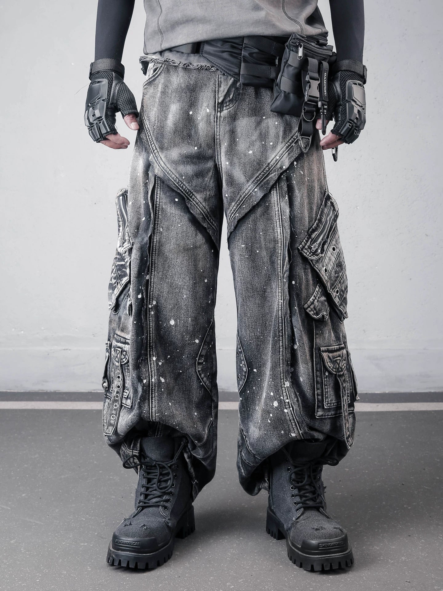 Sanhoostudio denim pants featuring paint splatter finish, multi-pocket design, and wide leg silhouette. Built for bold streetwear styling with a rugged aesthetic, functional details, and comfortable everyday wear.