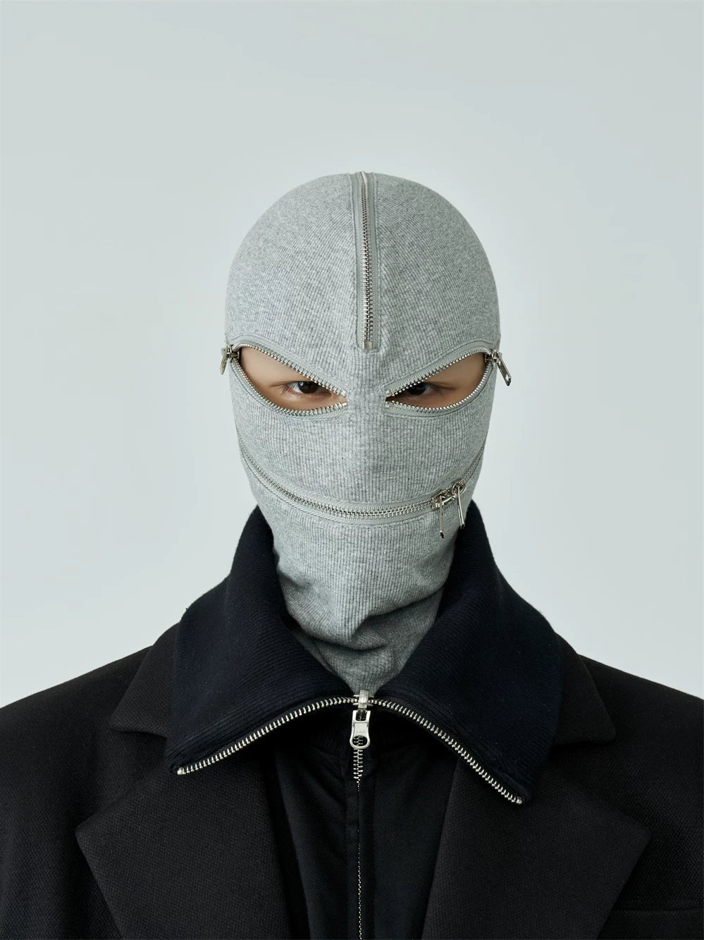Sanhoostudio black and white zip-up hood mask designed for unisex streetwear styling. Featuring a full zip closure, foldable structure, and warm layered design for casual spring wear.