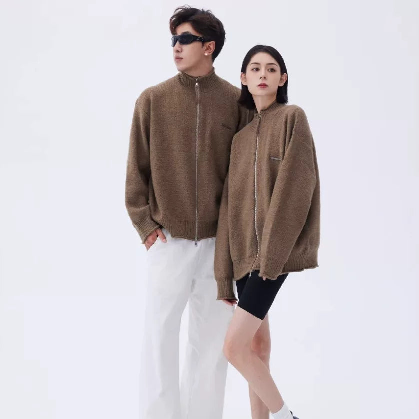Sanhoostudio knit cardigan with rolled hem detail and relaxed fit. A unisex piece designed for daily wear and layering.