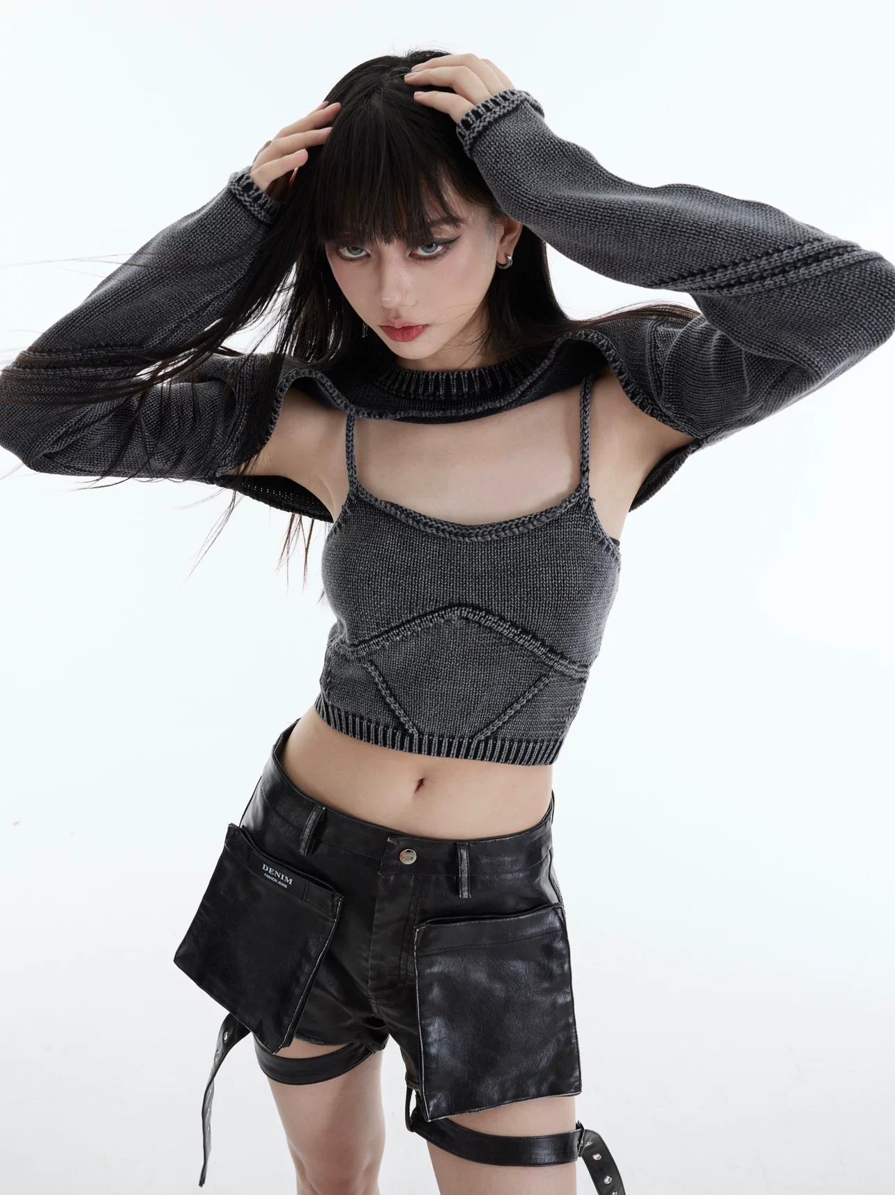 Sanhoostudio two-piece knit set featuring a washed vintage finish. Includes a cropped knit top and relaxed shawl-style outer layer.