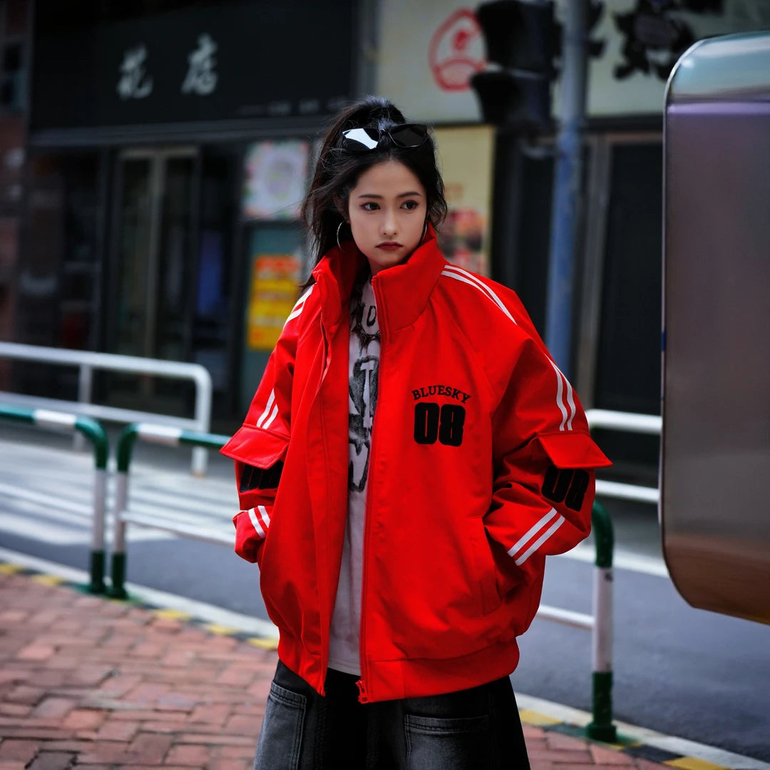 A heavy stand-collar moto jacket with bold embroidery and reinforced warmth. Designed for edgy streetwear lovers seeking both style and function.