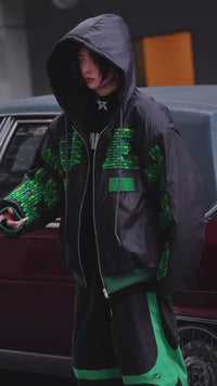 Sanhoostudio heavyweight hooded jacket features handcrafted patchwork details, a relaxed oversized fit, and a double-breasted front. Designed for winter warmth with bold street attitude.