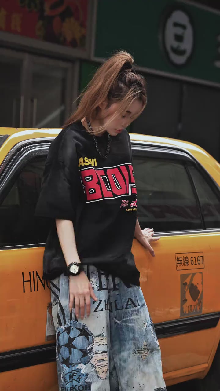 Sanhoostudio longline T-shirt featuring extended length and relaxed fit for modern streetwear styling and everyday wear.