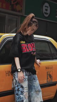 Sanhoostudio longline T-shirt featuring extended length and relaxed fit for modern streetwear styling and everyday wear.