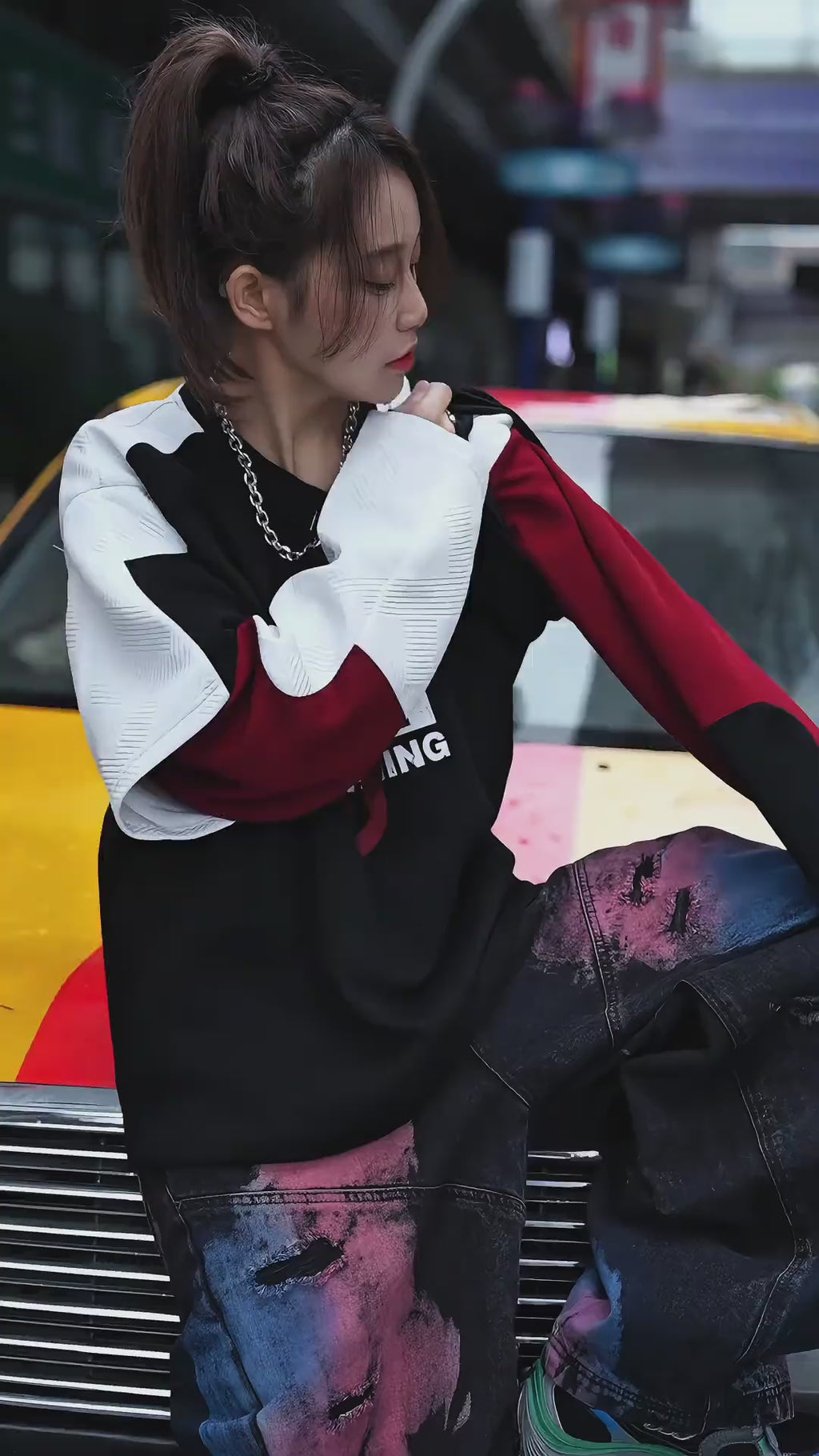 A vintage-inspired two-tone hoodie with a layered look and oversized silhouette. Comfortable, versatile, and perfect for daily streetwear.