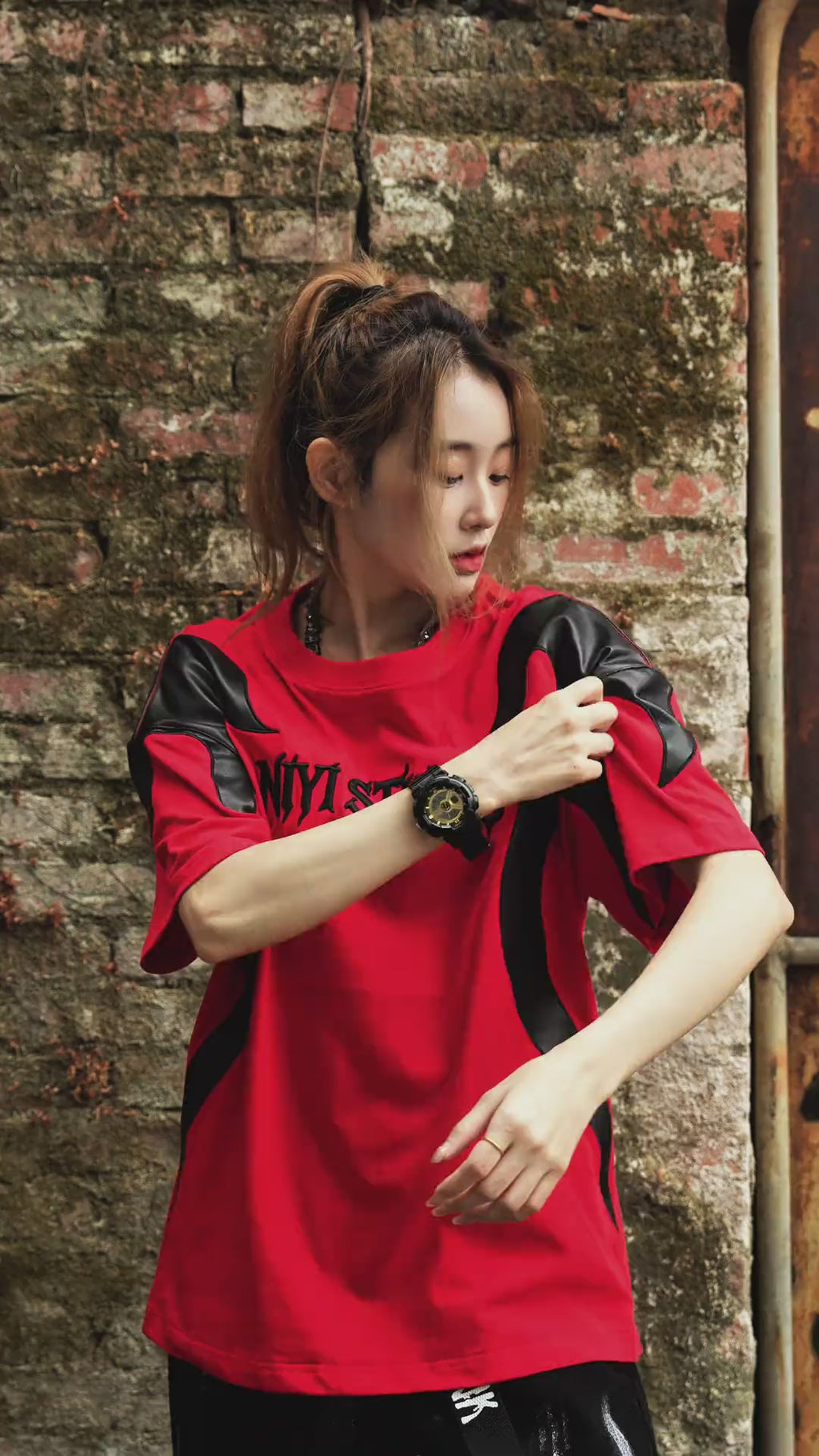 Sanhoostudio short sleeve T-shirt featuring deconstructed design and colorblock pattern for modern streetwear outfits.